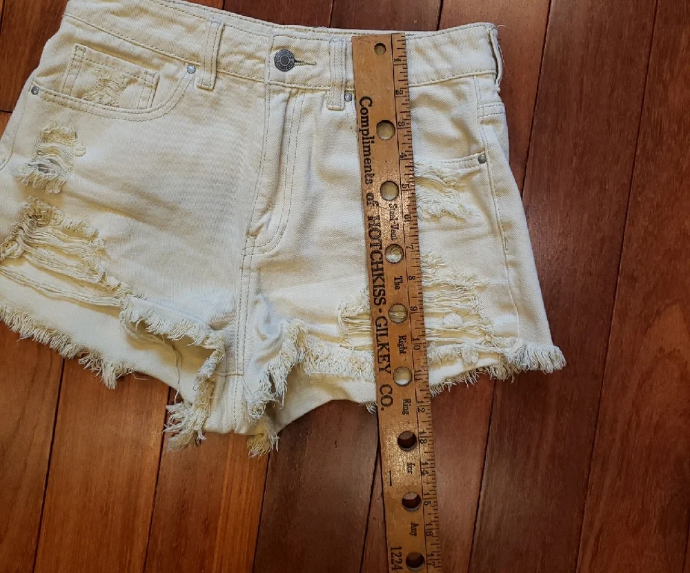 Pac Sun Women's size 26 Mom Short. Light yellow destructed denim jean